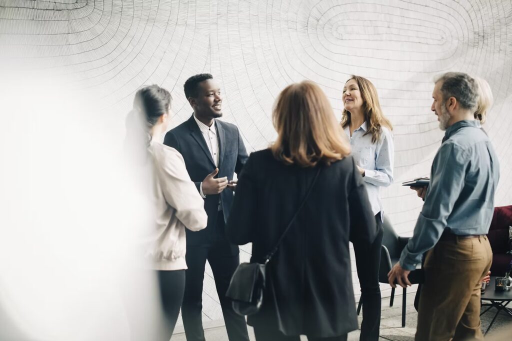 multiracial people in a business context discussing