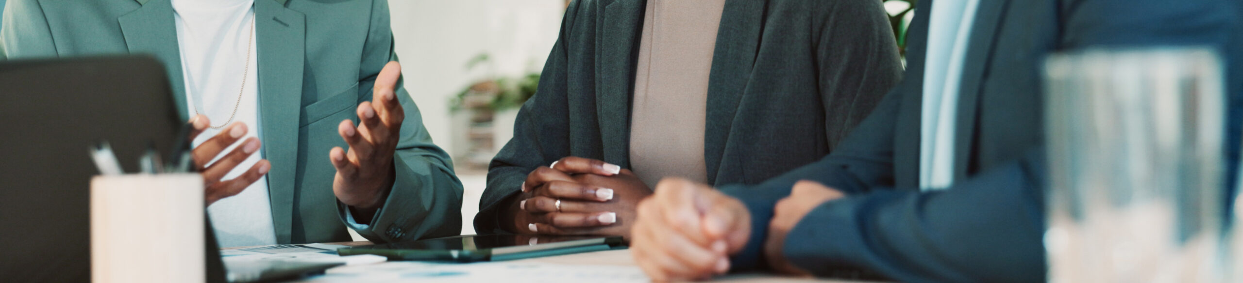Office, partnership and collaboration feedback for laptop, proposal and research notes with document for team. Man, woman and advice for small business, report and meeting for training or b2b project.