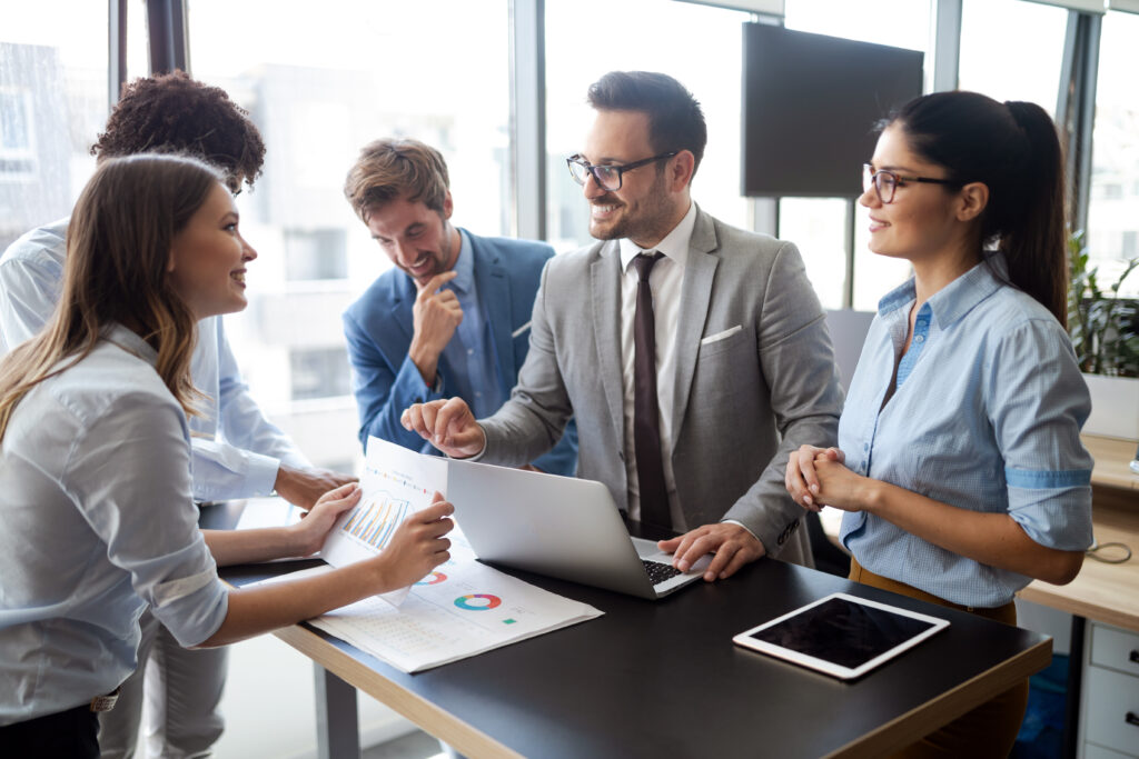 Successful happy business group of people at work in office